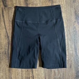 Girlfriend Collective Black High-Rise Bike Shorts. Size medium.